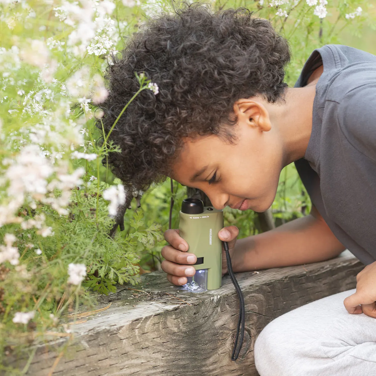 Uncommon Goods Kids Pocket Microscope with built-in LED light and adjustable magnification