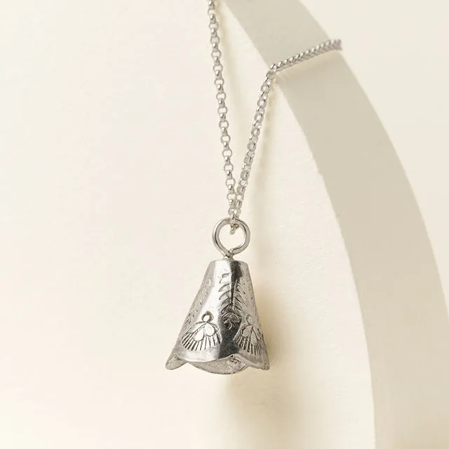 Uncommon Goods | Balance Bell Necklace | Silver Bell Necklace