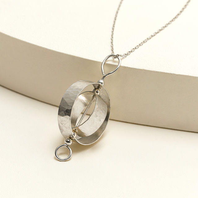 Spinning Karma Necklace